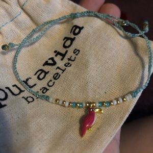 A baby blue pink bird bracelet